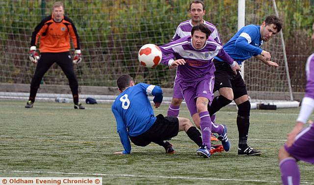 ACTION STATIONS: Santos's Andrew Wade gets stuck in.