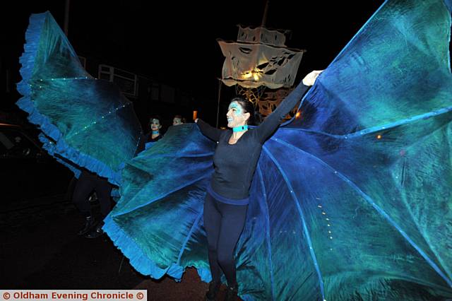 Mossley Christmas lights switch on and parade from Seel Park. Global Grooves.
