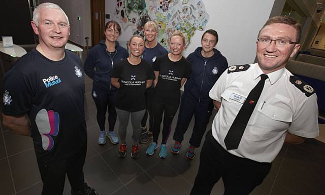 FROM the left: Bryn Hughes, Sergeant Michelle Lomas, PC Jennifer Reeve, Sergeant Cecelia Oakley, PC Jenni Smith, PC Stuart Rostron and Chief Constable Ian Hopkins