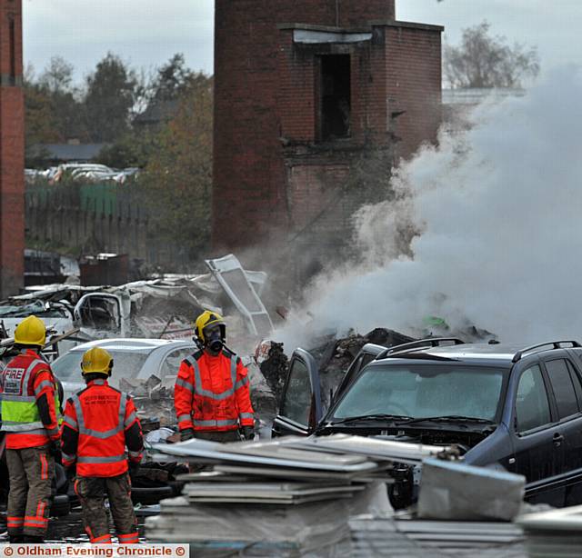 Fire at Maple Mill, Fitton Hill. Dumped vehicles and rubbish affected.