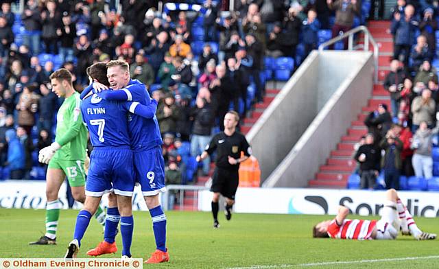 WHAT A BEAUTY . . . Billy Mckay is congratulated by fellow goal scorer Ryan Flynn as Athletic head towards victory in the FA Cup