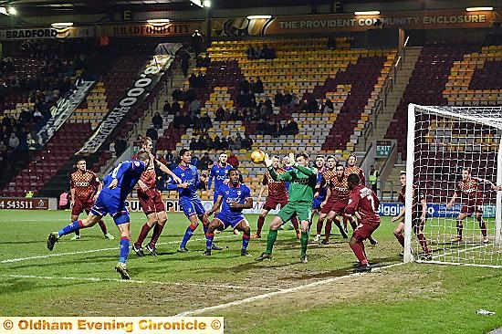 SO CLOSE . . . Athletic captain Liam Kelly (left) sees a late header saved as his side push for an equaliser. 