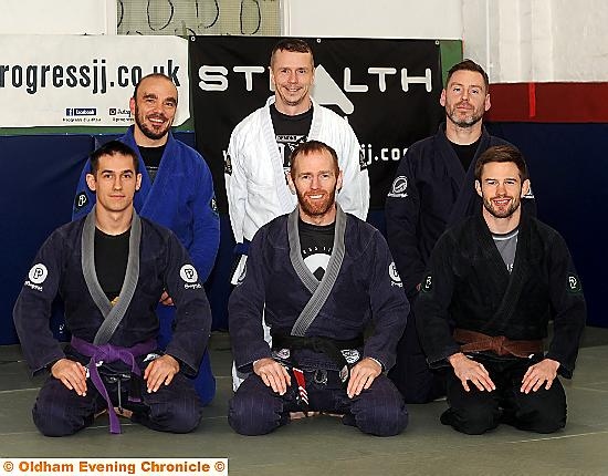 HEADING FOR PORTUGAL . . . Stealth Brazilian Jiu-Jitsu Club members, from left to right, back: Roberto Mura, Peter Wilson, Phil Russell. Front: Nemil Malczewski, Steve Campbell, Jake Corrigan. HEADING FOR PORTUGAL . . . Stealth Brazilian Jiu-Jitsu Club members, from left to right, back: Roberto Mura, Peter Wilson, Phil Russell. Front: Nemil Malczewski, Steve Campbell, Jake Corrigan.