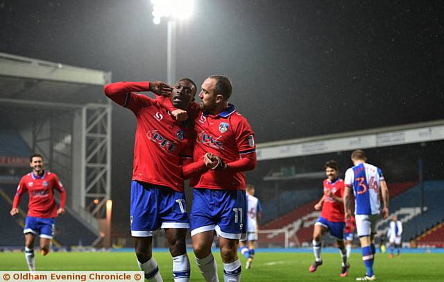 GET IN: Freddie Ladapo celebrates his 49th-minute strike with penalty hero Lee Croft