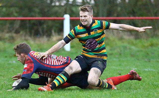 TRY TIME . . . Ryan North touches down for Oldham