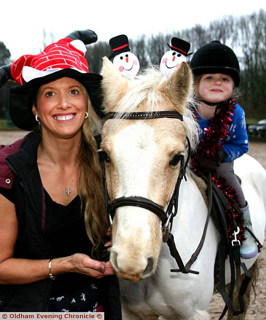 CAROLINE Platt, with her daughter, Savannah Platt, aged four, with her horse, Dan CAROLINE Platt, with her daughter, Savannah Platt, aged four, with her horse, Dan