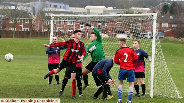 CLOSE . . . a Church corner-kick is cleared by the Britannia goalkeeper