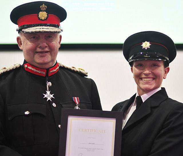 The Lord-Lieutenant of Greater Manchester Mr. Warren J. Smith presents certificate to Jenna Cahill 