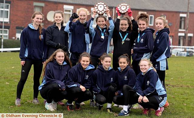 WE ARE THE CHAMPIONS . . . the triumphant Saddleworth team celebrate 