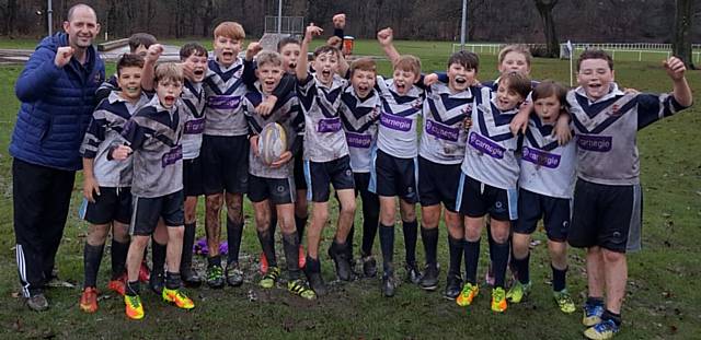 HAPPIER DAY . . . Saddleworth School Year Sevens are pictured after their win against St Peter's and Paul
