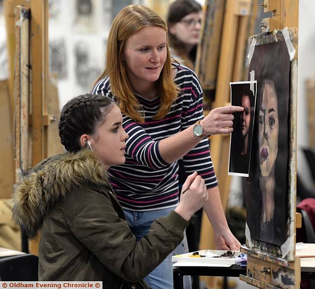 Oldham Sixth Form College, Oldham. Portrait artist Stefanie Trow working with students. Pictured here are student Lilly Maloney-De Leeuw Van Weenen (16) with artist Stefanie Trow. Oldham Sixth Form College, Oldham. Portrait artist Stefanie Trow working with students. Pictured here are student Lilly Maloney-De Leeuw Van Weenen (16) with artist Stefanie Trow.