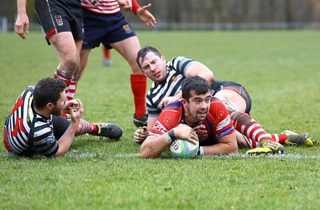 JUST MADE IT . . . Josh Walton nips in to score Oldham's second try
