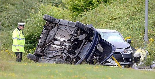 The car after it flipped and landed on top of another car
The car after it flipped and landed on top of another car