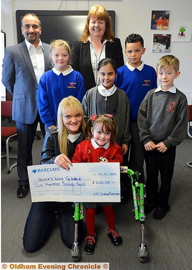 MAKING a wish come true . . . Olivia Berry and mum Christie Kindon receive the donation. Back, from left, Rais Bhatti (head of school, Yew Tree), Eleanor Riley (Mather Street), Sally Brown (head of school Mather Street), Hannah Ahmed (Yew Tree), Nico O’Reilly (Mather Street) and Liam Vickery (Yew Tree) MAKING a wish come true . . . Olivia Berry and mum Christie Kindon receive the donation. Back, from left, Rais Bhatti (head of school, Yew Tree), Eleanor Riley (Mather Street), Sally Brown (head of school Mather Street), Hannah Ahmed (Yew Tree), Nico O’Reilly (Mather Street) and Liam Vickery (Yew Tree)