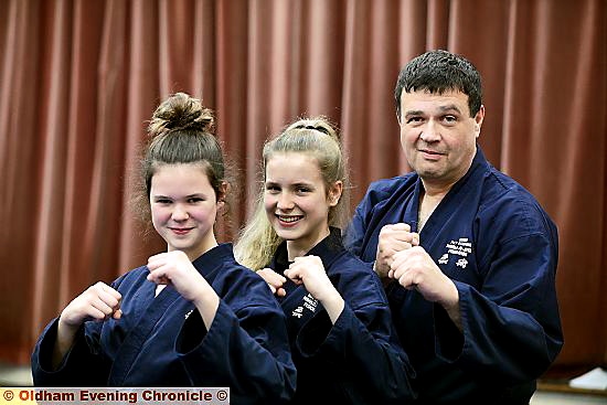 Daughters Caitlin (left) and Mia O’Connor strike a pose alongside their father, Pat.