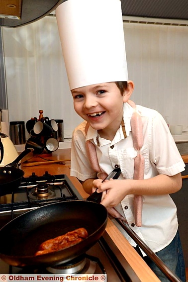 IN the kitchen . . . chef William Fedden cooks his pizza sausage roll, described by celebrity chef Paul Rankin as a fun twist on a children’s favourite