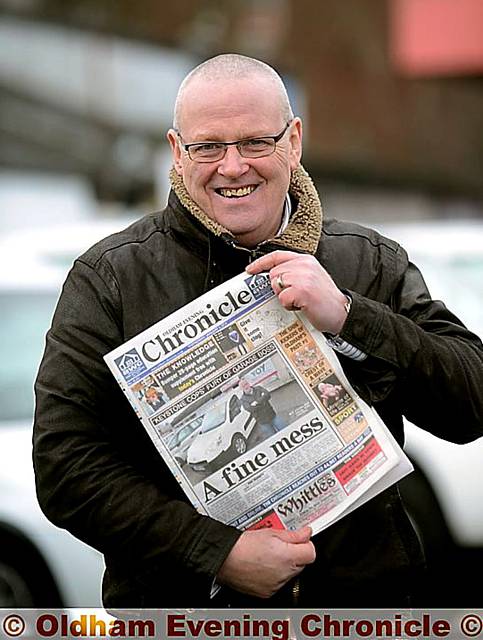 A SMILING John Igoe after receiving an apology