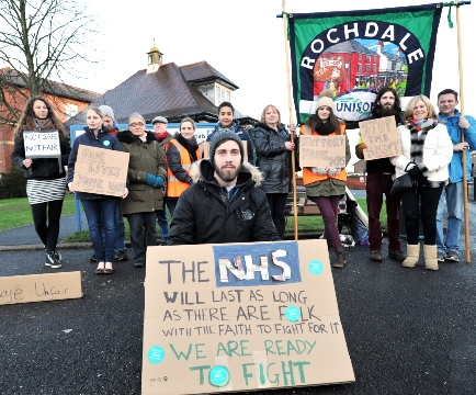 WALKOUT . . . Dr Rory Hicks and supporters outside the Royal Oldham Hospital WALKOUT . . . Dr Rory Hicks and supporters outside the Royal Oldham Hospital