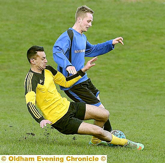 SLIDING TACKLE: Umair Iqbal of Coppice (left) challenges White House’s Dylan Ault. SLIDING TACKLE: Umair Iqbal of Coppice (left) challenges White House’s Dylan Ault.