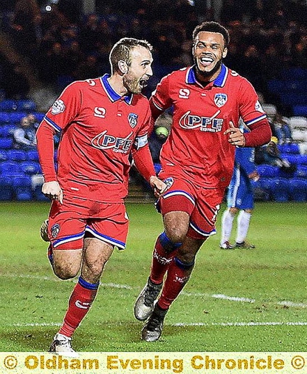 Liam Kelly celebrates after tucking home the winner from the spot.