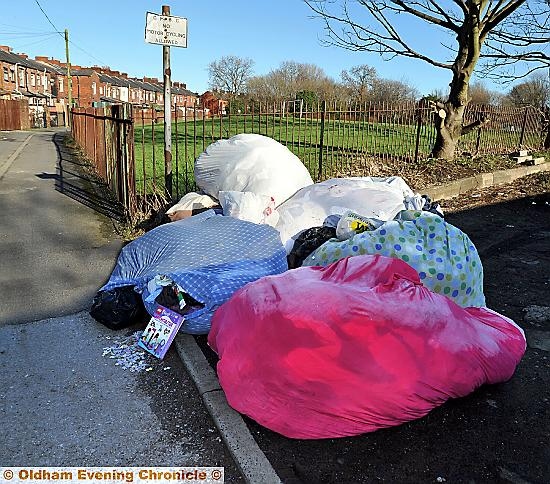 WHAT a mess . . . a mountain of rubbish dumped in Chadderton WHAT a mess . . . a mountain of rubbish dumped in Chadderton