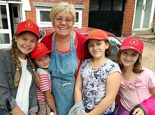 BABUSHKA . . . ‘grandmother’ Theresa Novotny with young visitors who came to Oldham last year (from left) Darya Harbunova, Hanna Savina, Dasha Pilipchuk and Anhelina Tarik BABUSHKA . . . ‘grandmother’ Theresa Novotny with young visitors who came to Oldham last year (from left) Darya Harbunova, Hanna Savina, Dasha Pilipchuk and Anhelina Tarik