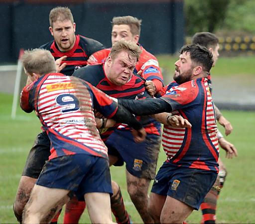 TEAMWORK: Callum Megram (left) and Jamie Edwards combine to stop an Aspatria forward.
TEAMWORK: Callum Megram (left) and Jamie Edwards combine to stop an Aspatria forward.