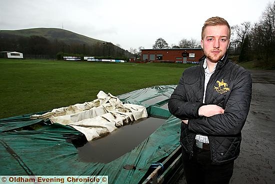 ADAM Smalley surveys the sodden pitch. PICTURES by PAUL STERRITT. ADAM Smalley surveys the sodden pitch. PICTURES by PAUL STERRITT.