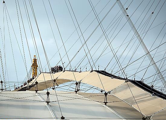 WALKING the Millenium Dome . . . a narrow path leads over the top