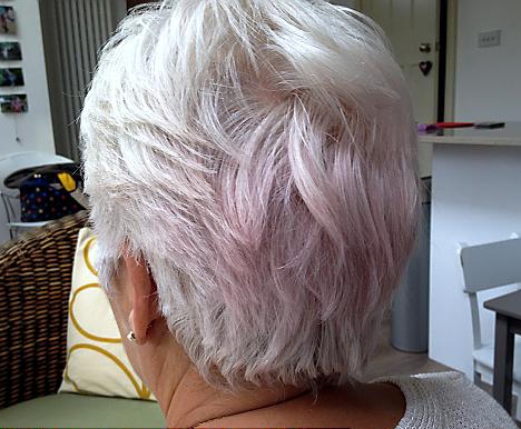 FROM white to pink . . . the 61-year-old believes the colour change in her hair was caused by using her new red bedding FROM white to pink . . . the 61-year-old believes the colour change in her hair was caused by using her new red bedding