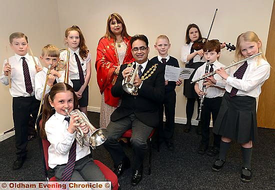 JOINING in: Oldham Mayor, Councillor Ateeque Ur-Rehman and Mayoress, Councillor Yasmin Toor, join Diggle School pupils (back, from left) Jack McQuillan, James Sleight, Carys Winskill, Billy Martin, Imogen Cox, George Redfearn and Sophie Hawes. Front: Poppy Blair JOINING in: Oldham Mayor, Councillor Ateeque Ur-Rehman and Mayoress, Councillor Yasmin Toor, join Diggle School pupils (back, from left) Jack McQuillan, James Sleight, Carys Winskill, Billy Martin, Imogen Cox, George Redfearn and Sophie Hawes. Front: Poppy Blair