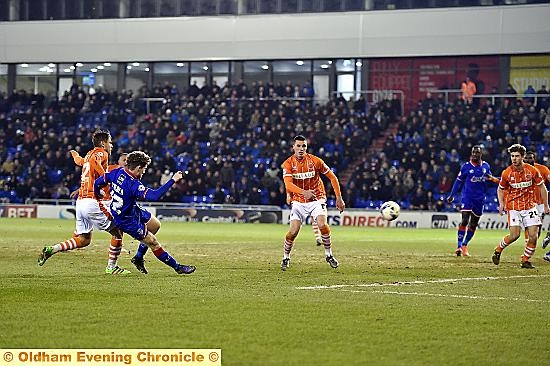 get in: Matt Palmer scores the only goal of the game against Blackpool