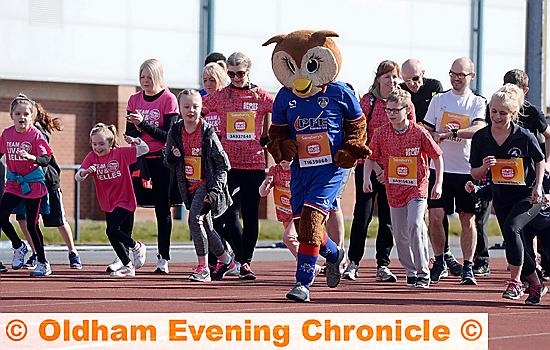 READY, set, go!.... Runners, including Chaddy the Owl, set off at Oldham’s Sport Relief Mile