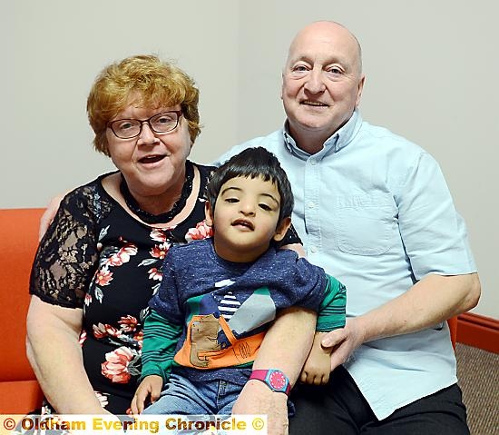 POWER of love . . . Anne and Lloyd Morgan with their adopted son, Adam POWER of love . . . Anne and Lloyd Morgan with their adopted son, Adam