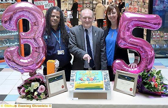 Centre Manager Mike Flanagan with Eric and Suzanne