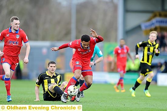 AARON Amari-Holloway battles for the ball at Burton Albion. AARON Amari-Holloway battles for the ball at Burton Albion.