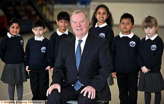 Bare Trees headteacher John Tobin with (l-r) pupils Nayyira Malik, Haris Kayani, Abdul Habib, Suhana Begum, Abdul Qabid and Emillie Davies.