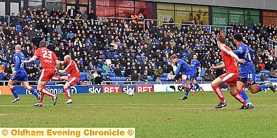 WHISTLED WIDE: Matt Palmer (centre) lets fly against Chesterfield and narrowly fails to hit the target. WHISTLED WIDE: Matt Palmer (centre) lets fly against Chesterfield and narrowly fails to hit the target.
