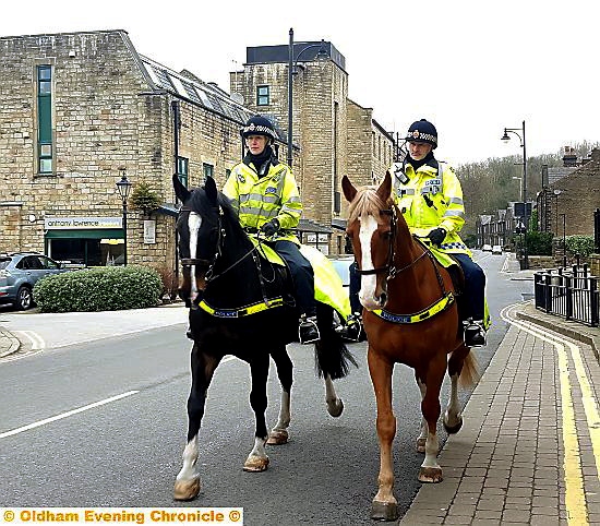 ALL geed up . . . police horses on Uppermill High Street ALL geed up . . . police horses on Uppermill High Street