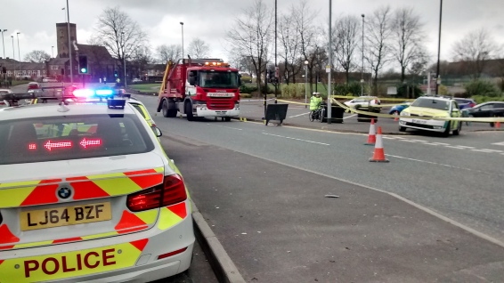 CORDONED off . . . police closed Shaw Road shortly after the incident CORDONED off . . . police closed Shaw Road shortly after the incident