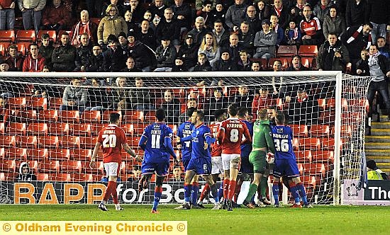 FLASHPOINT . . . Athletic goalkeeper Joel Coleman gets involved in a fracas in the second half.
