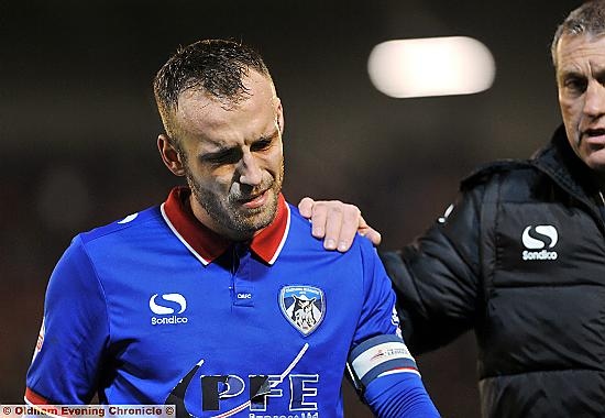 skipper Liam Kelly gets a comforting hand from assistant manager Peter Shirtliff. skipper Liam Kelly gets a comforting hand from assistant manager Peter Shirtliff.