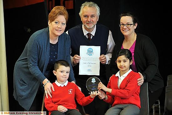 AWARD . . . Julie Slattery (teaching assistant), Stuart Vaughan (Diabetes UK) and Debbie Bardsley (medical needs co-ordinator) with Rocque Prescott and Ayesha Javid