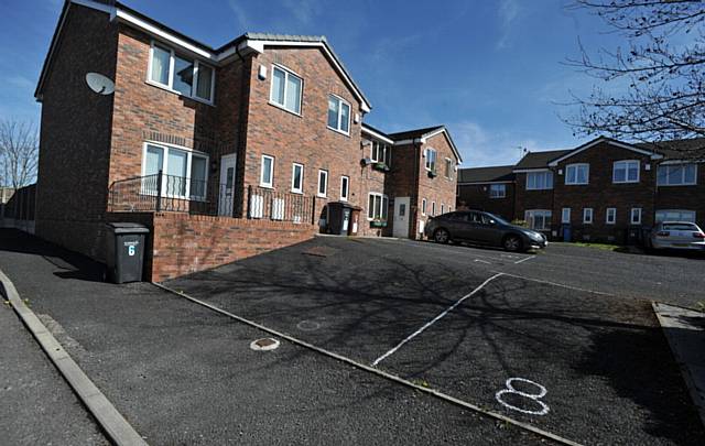 The road on Bowling Green Close in Chadderton has never been finished.