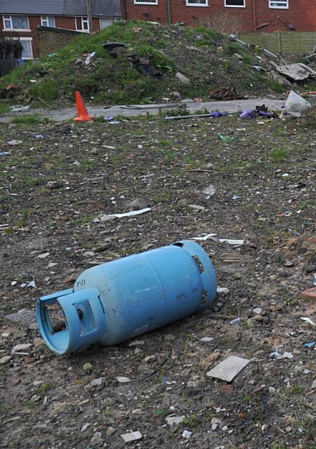 DANGER . . . one of the potentially lethal gas cylinders