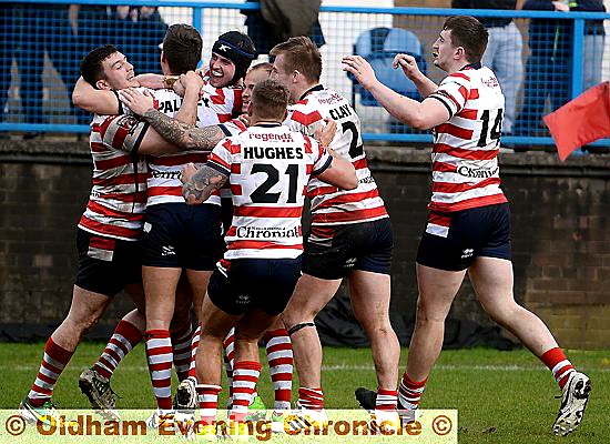 MILES OF SMILES . . . Liam Johnson (third, left) is mobbed by his team-mates after scoring Oldham’s second try in the defeat of Batley Bulldogs at Bower Fold. MILES OF SMILES . . . Liam Johnson (third, left) is mobbed by his team-mates after scoring Oldham’s second try in the defeat of Batley Bulldogs at Bower Fold.