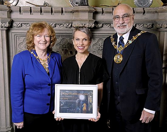AWARD: Sue Devaney receives her award from the Mayoress of Rochdale, Councillor Cecile Biant, and the Mayor, Councillor Surinder Biant. AWARD: Sue Devaney receives her award from the Mayoress of Rochdale, Councillor Cecile Biant, and the Mayor, Councillor Surinder Biant.