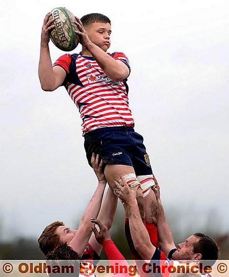 LIFT-OFF . . . Lewis North gets a helping hand from two Oldham team-mates as he catches the ball at a line-out. LIFT-OFF . . . Lewis North gets a helping hand from two Oldham team-mates as he catches the ball at a line-out.