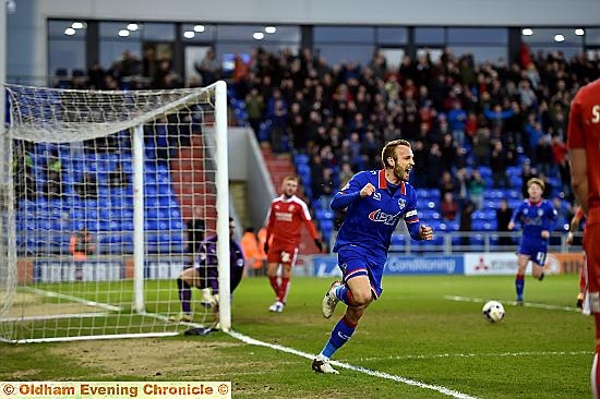 OH YES! Skipper Liam Kelly wheels away to celebrate the opening goal.