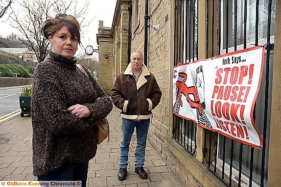 Dona and Graham Unsworth of Jack Essex from Mossley with a road safety campaign poster at Pennine Medical Centre, Mossley Dona and Graham Unsworth of Jack Essex from Mossley with a road safety campaign poster at Pennine Medical Centre, Mossley